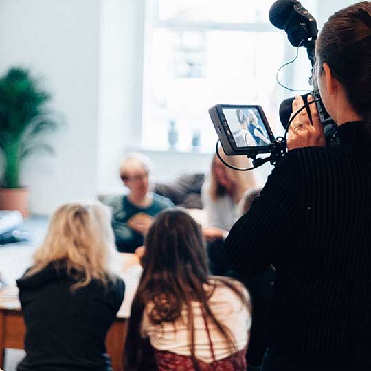 A video production company filming a video for a business in London